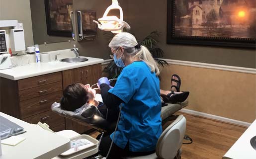 patient getting a dental cleaning